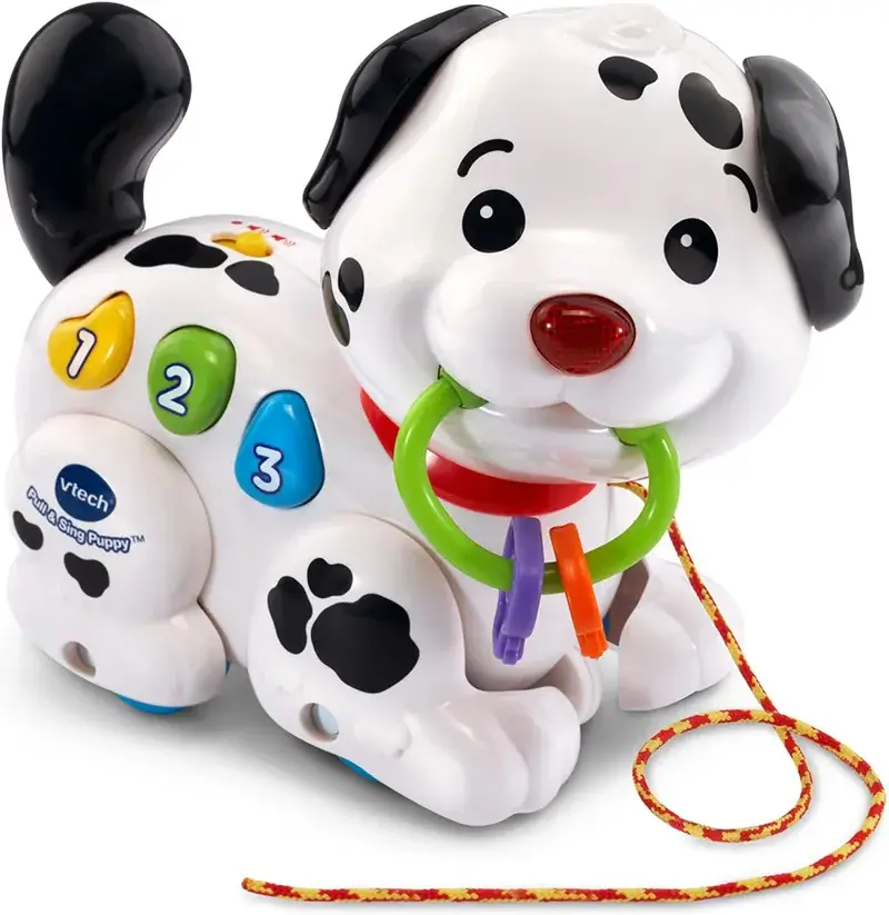 Mainan anjing interaktif VTech dengan tombol warna-warni.